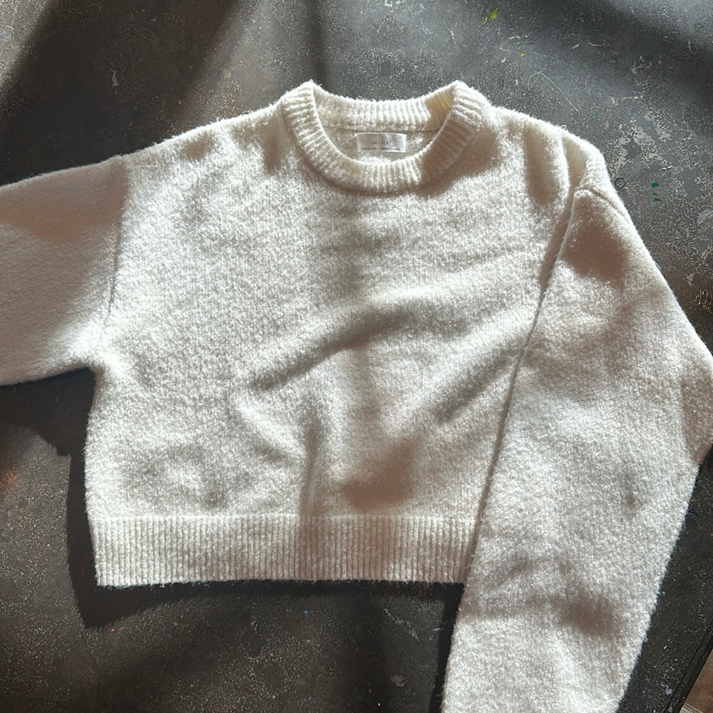 White sweater